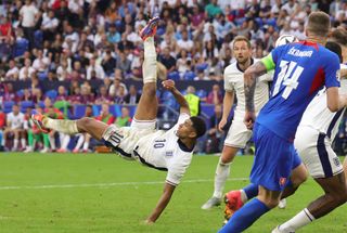 Jude Bellingham netting his stoppage time overhead kick